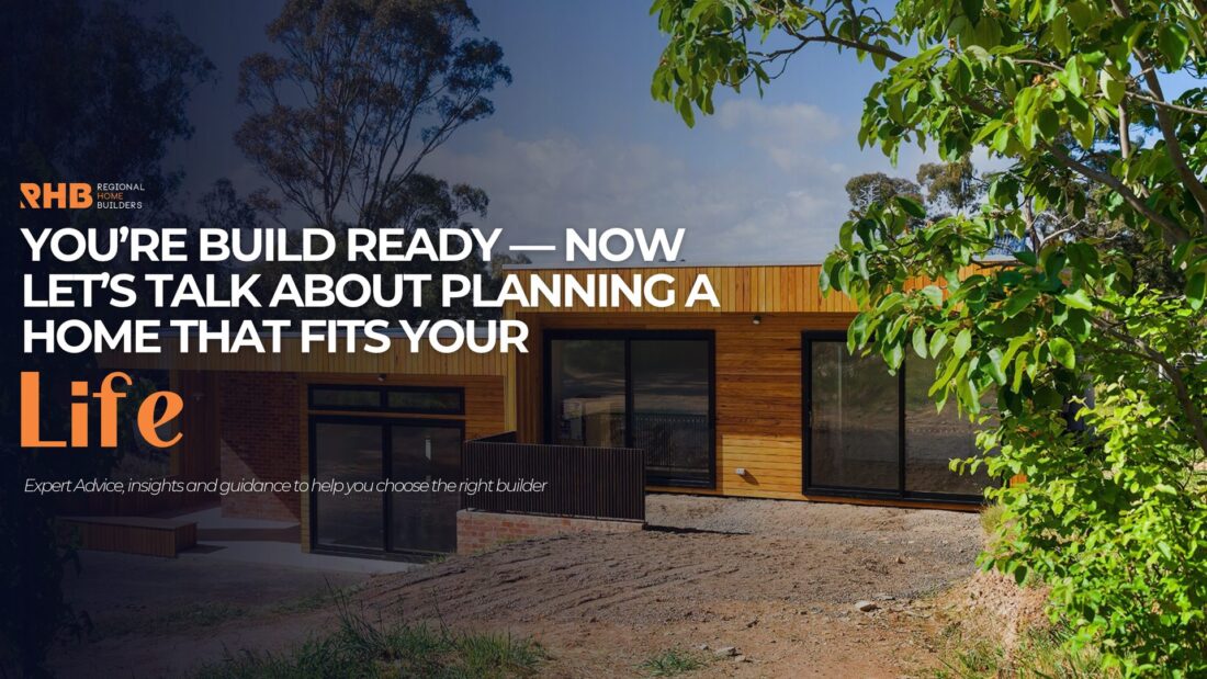 Custom timber-clad home with large sliding doors on a sloping block by Regional Home Builders, Bendigo